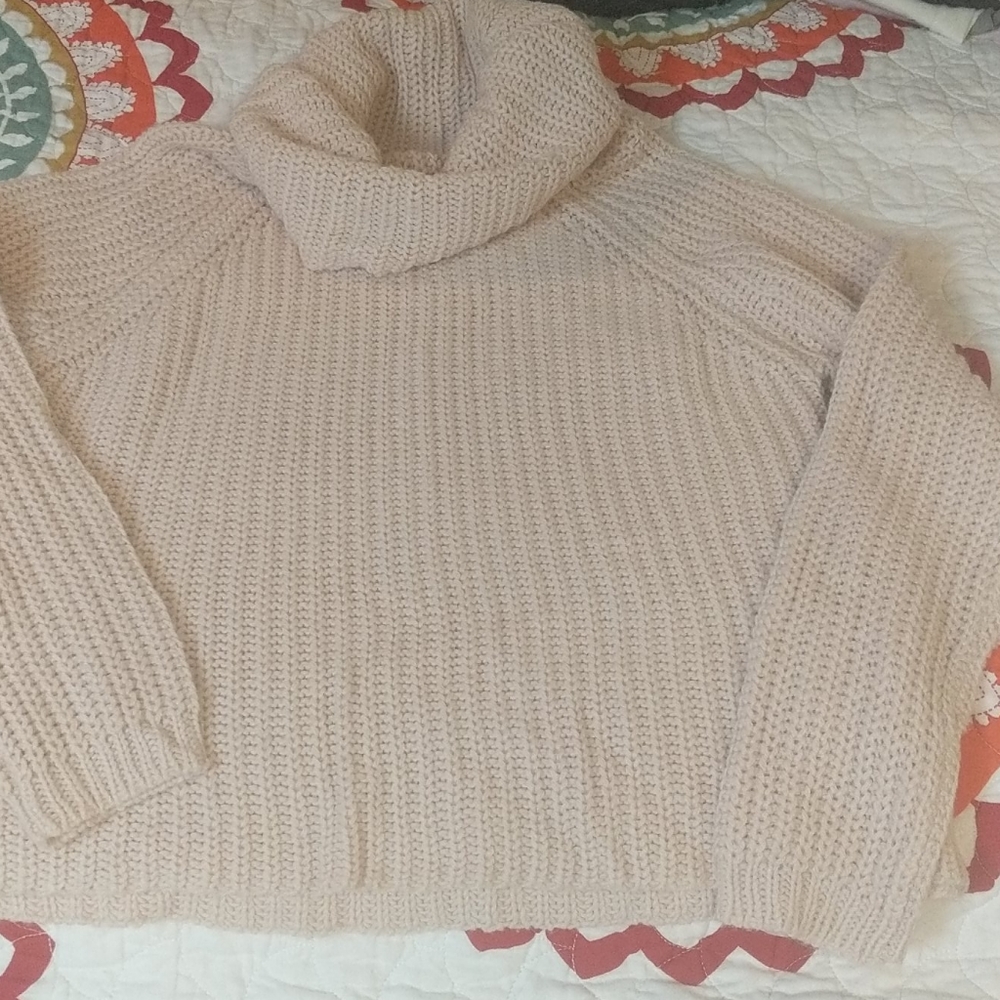 Turtleneck cream sweater